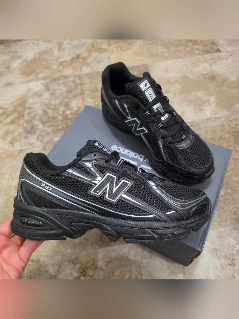 New Balance 740 sneakers / Black and Silver Metallic colorway